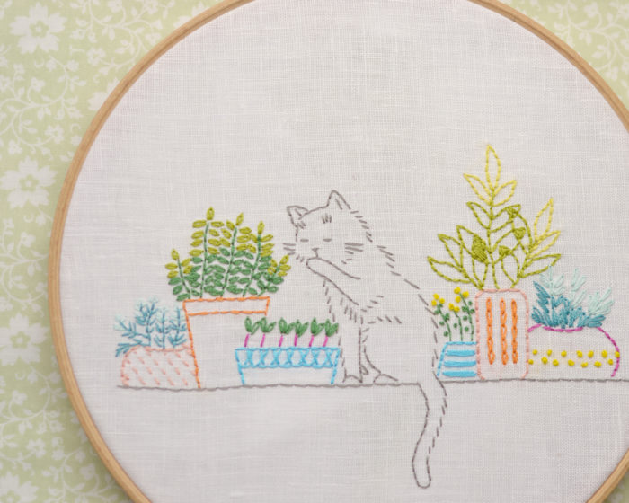 Windowsill garden cat hand embroidery hoop