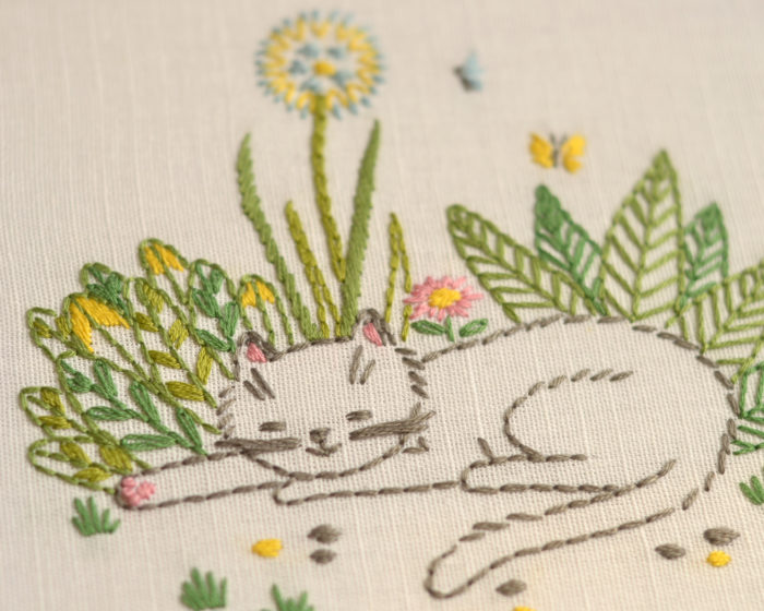 Cat in garden flowers hand embroidery stitches