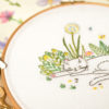 Cat in garden flowers hand embroidery hoop