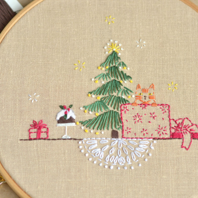 Cat under the Christmas tree hand embroidery hoop