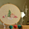 Cat under the Christmas tree hand embroidery hoop